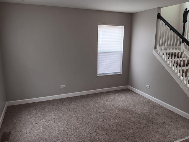 view of carpeted spare room