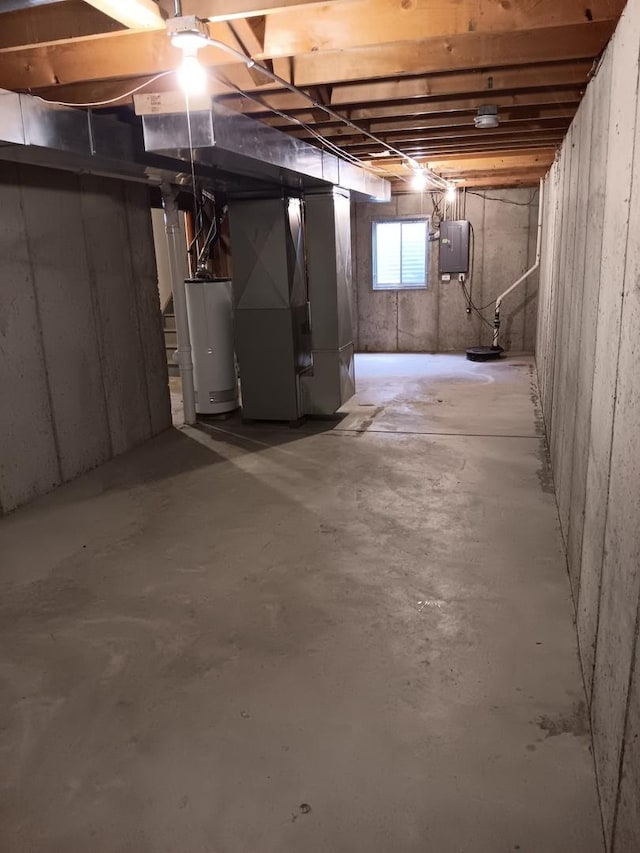 basement with heating unit and water heater