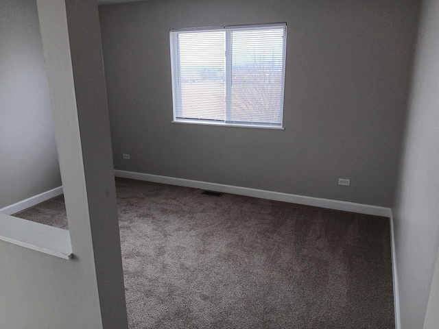 unfurnished room with carpet floors