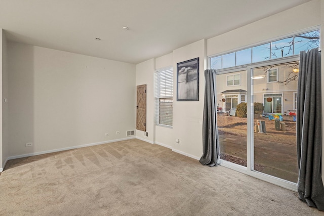 view of carpeted spare room