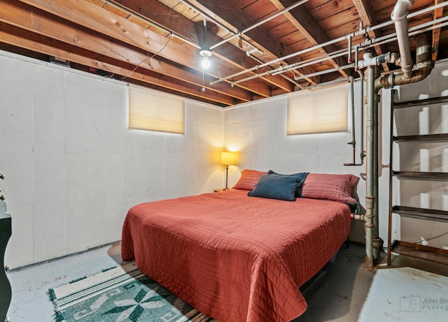 bedroom with concrete floors