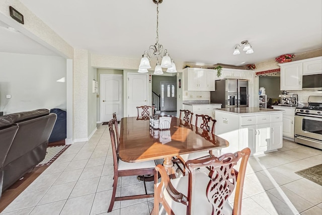 8431 Nielsen Dr, Tinley Park, IL 60487 - tiled dining room featuring an inviting chandelier