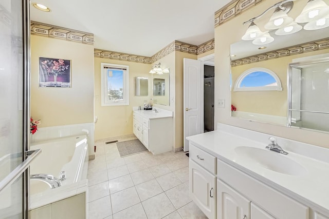 8431 Nielsen Dr, Tinley Park, IL 60487 - bathroom with vanity, tile patterned flooring, and a bathing tub