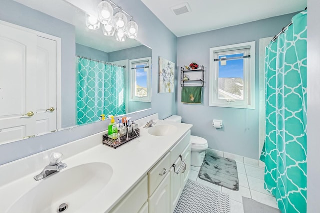 8431 Nielsen Dr, Tinley Park, IL 60487 - bathroom featuring vanity, tile patterned floors, and toilet