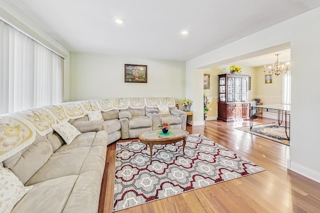 8431 Nielsen Dr, Tinley Park, IL 60487 - living room featuring hardwood / wood-style flooring and a chandelier