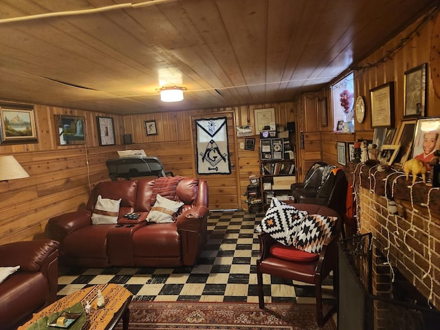 living room featuring wooden ceiling and wooden walls