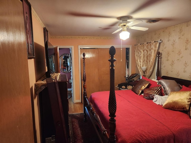 bedroom featuring ceiling fan and wood-type flooring