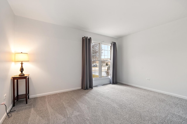 empty room with carpet flooring