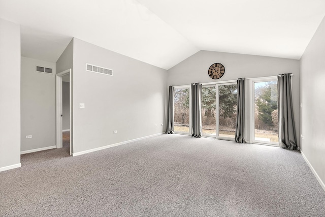 spare room featuring high vaulted ceiling and carpet