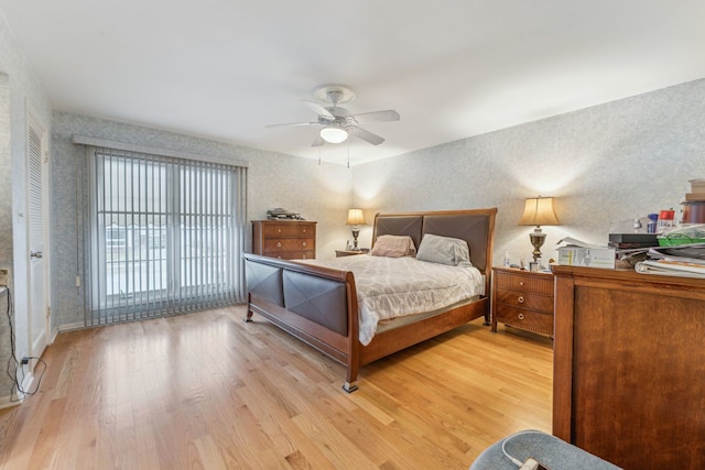 bedroom featuring ceiling fan and light hardwood / wood-style flooring