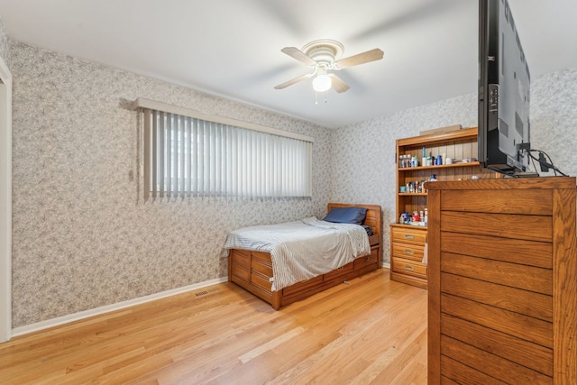 bedroom with light wood-type flooring