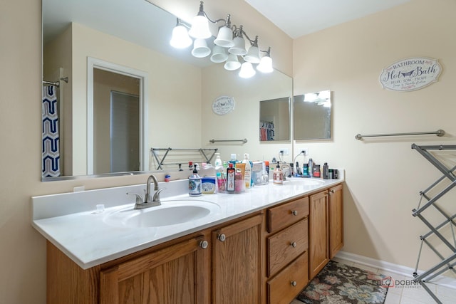 bathroom featuring vanity and tile patterned flooring