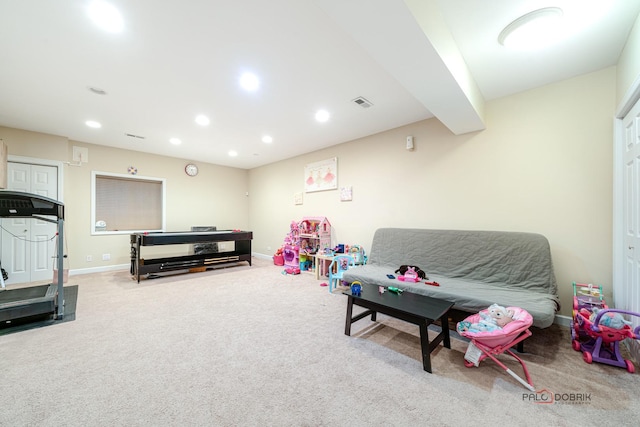 game room with beam ceiling and carpet flooring