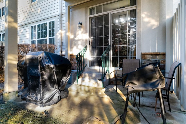 view of patio with a grill