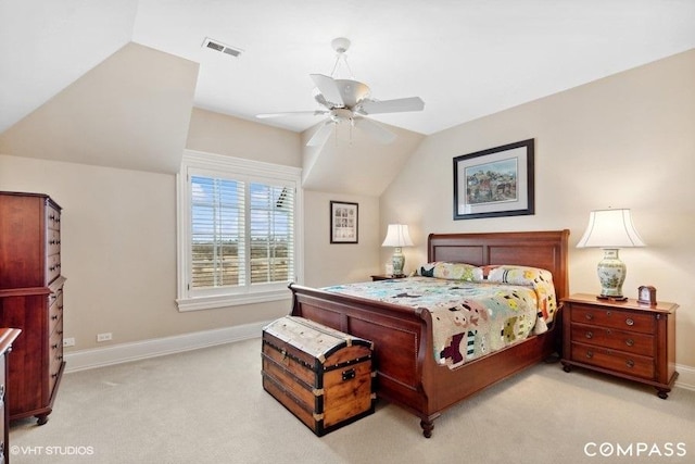 carpeted bedroom featuring ceiling fan and lofted ceiling