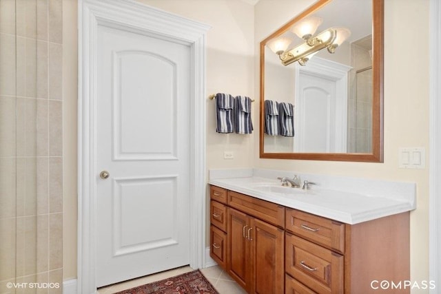 bathroom featuring vanity and tile patterned flooring