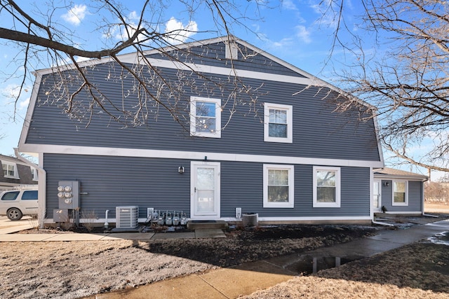 back of property with cooling unit