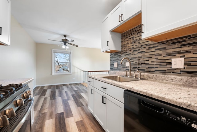 kitchen featuring sink, dishwasher, white cabinetry, backsplash, and dark hardwood / wood-style flooring