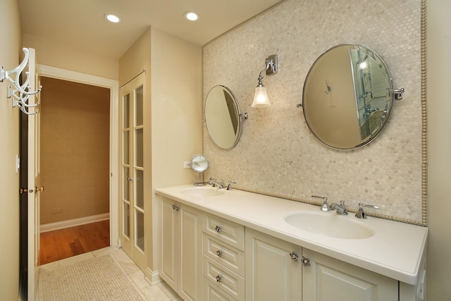 bathroom featuring vanity and tile patterned flooring