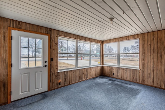 unfurnished sunroom featuring plenty of natural light