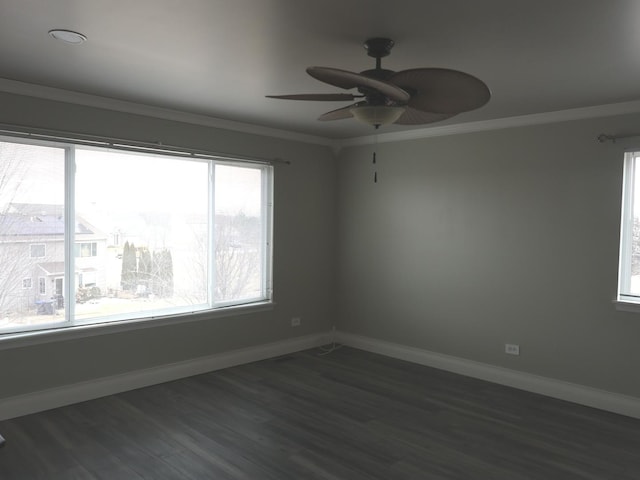 unfurnished room with crown molding, dark hardwood / wood-style floors, and ceiling fan