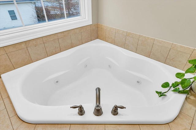 bathroom featuring a whirlpool tub