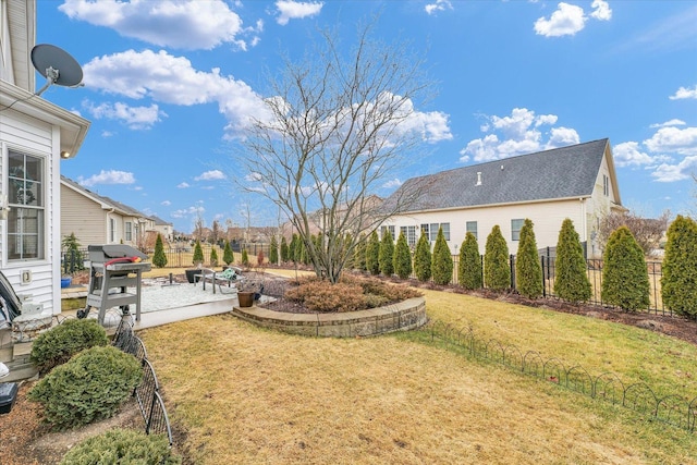 view of yard with fence and a patio area