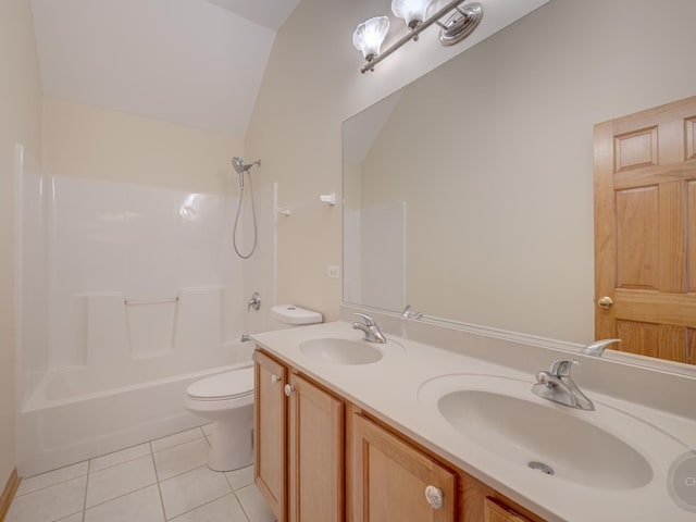 full bathroom with lofted ceiling,  shower combination, vanity, tile patterned floors, and toilet