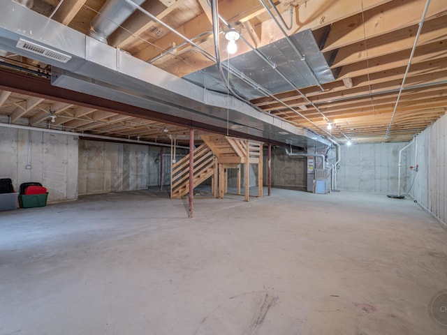 basement featuring heating unit