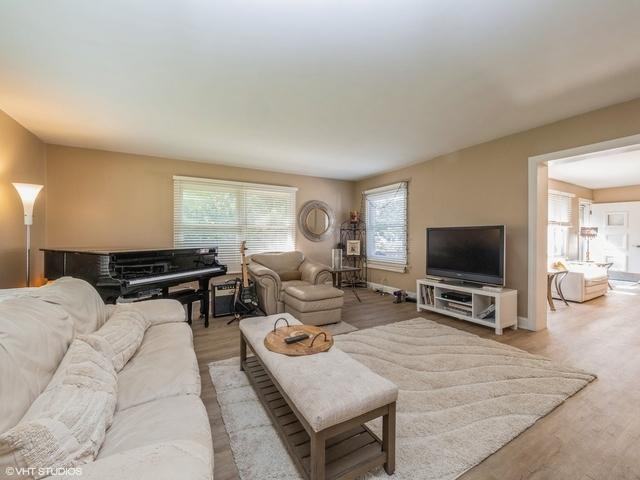 living area featuring light wood-style flooring