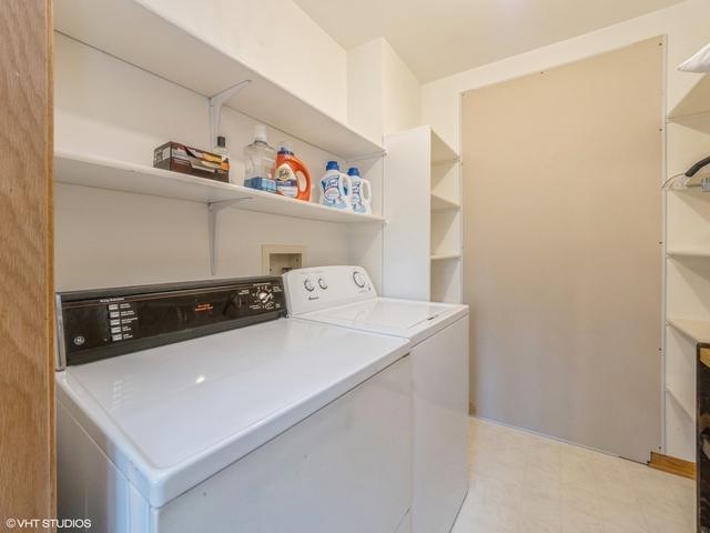 laundry area featuring laundry area and independent washer and dryer