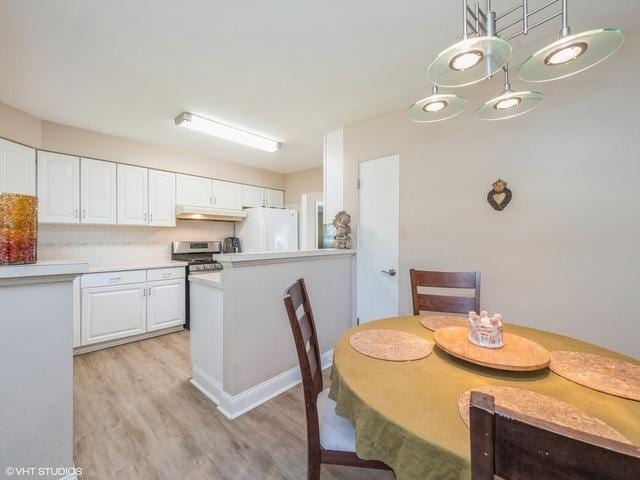 dining room featuring light wood-type flooring