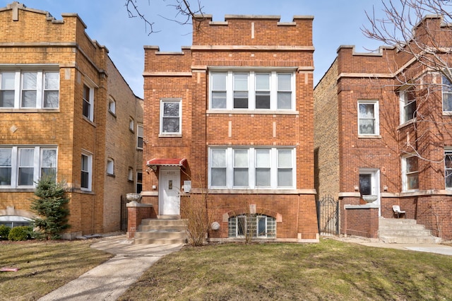 4820 W George St, Chicago, IL 60641 - view of front of property with a front yard, entry steps, and brick siding