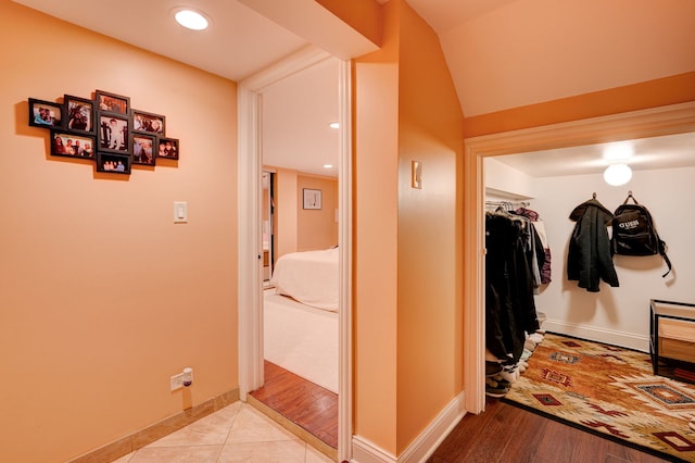 4820 W George St, Chicago, IL 60641 - corridor featuring baseboards, tile patterned flooring, and recessed lighting