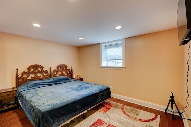 4820 W George St, Chicago, IL 60641 - bedroom featuring baseboards, wood finished floors, and recessed lighting