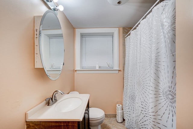 4820 W George St, Chicago, IL 60641 - bathroom with baseboards, curtained shower, toilet, and vanity