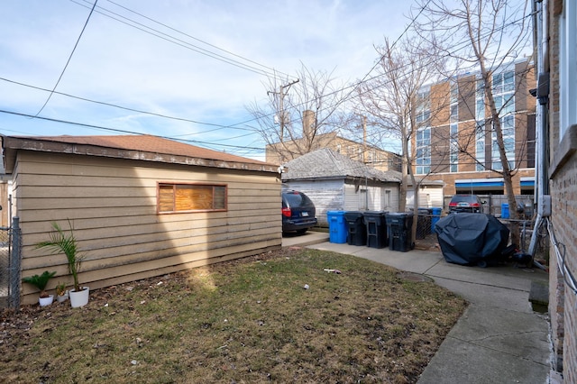 4820 W George St, Chicago, IL 60641 - view of yard with an outdoor structure and fence