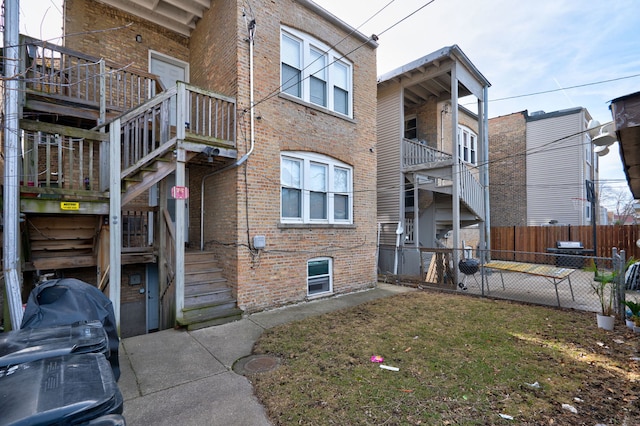 4820 W George St, Chicago, IL 60641 - view of building exterior with fence and stairway