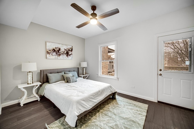 bedroom with dark wood-type flooring and ceiling fan