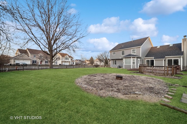 view of yard featuring a wooden deck