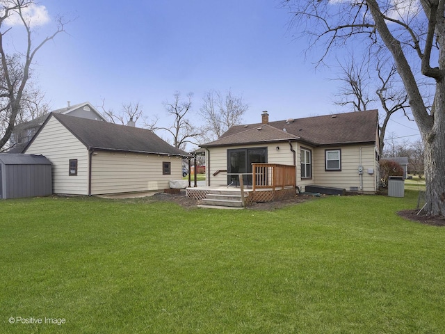 back of property with a wooden deck, central AC, a lawn, and a storage shed