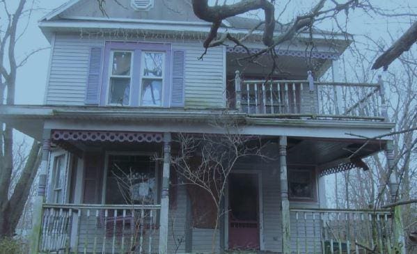 exterior space with a balcony and covered porch