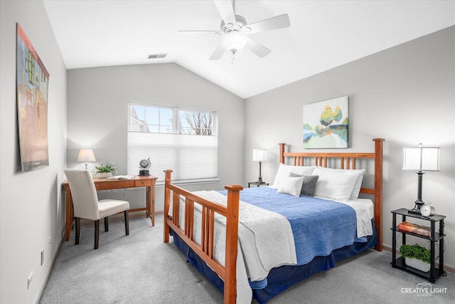 carpeted bedroom featuring ceiling fan and lofted ceiling