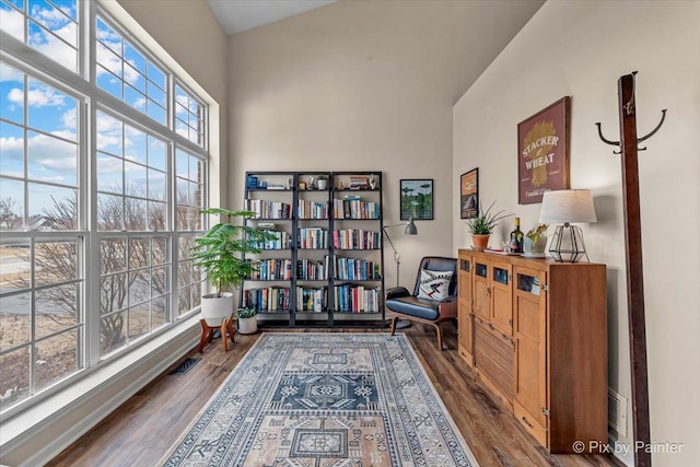 living area featuring hardwood / wood-style floors