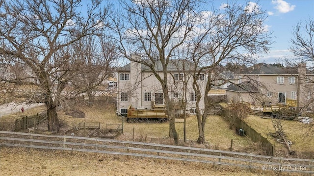 view of front of property featuring a wooden deck