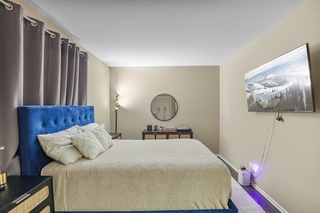 bedroom featuring hardwood / wood-style floors