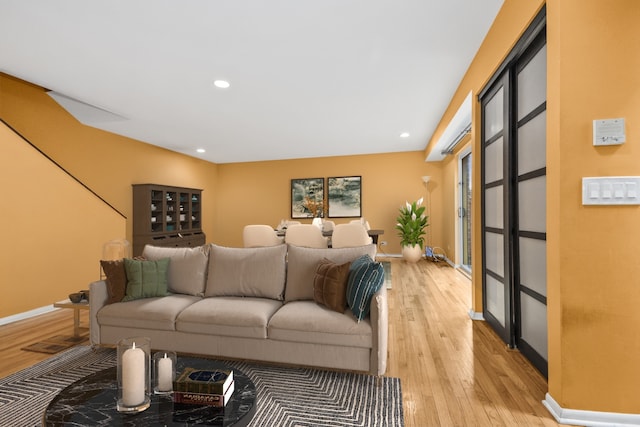 living room with light hardwood / wood-style floors