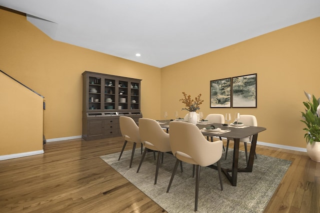 dining space featuring dark hardwood / wood-style flooring