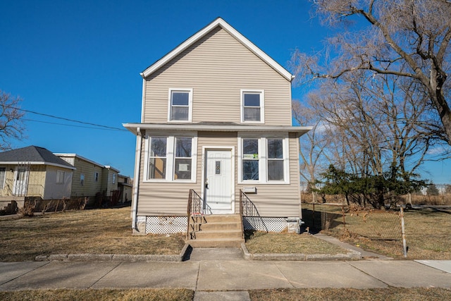 view of front property with a front lawn