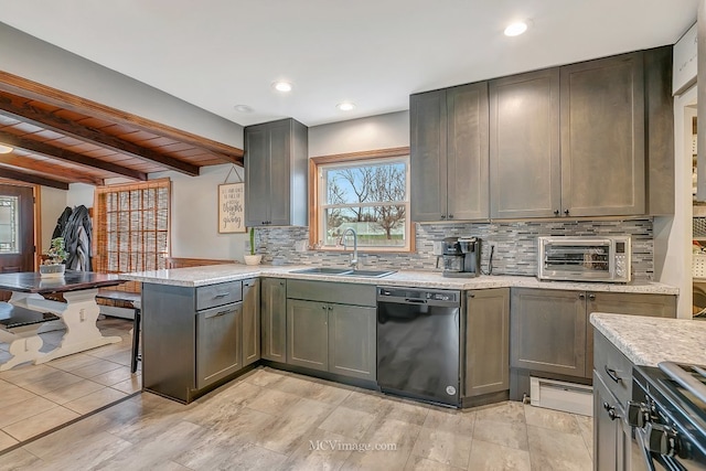 kitchen with sink, dishwasher, decorative backsplash, range with gas cooktop, and kitchen peninsula